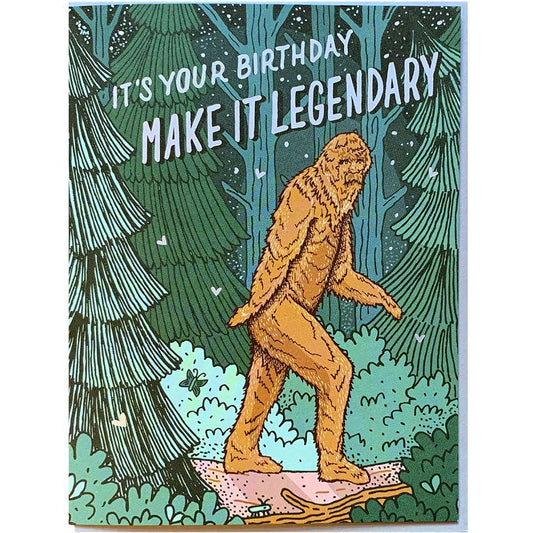 Birthday card with a cartoon Sasquatch in a forest, text 'It's your birthday, make it legendary'.